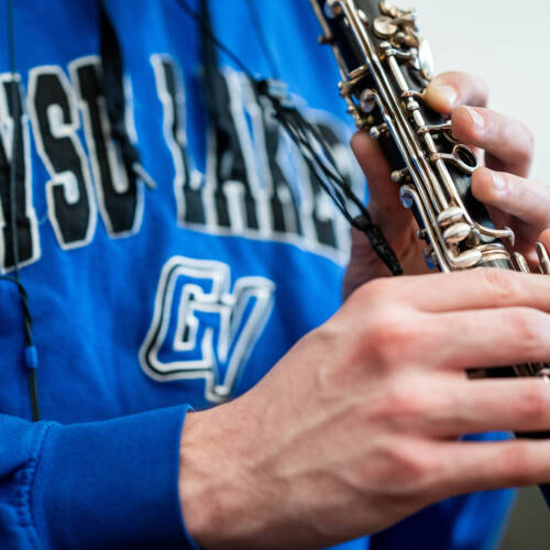 clarinet player wearing GVSU sweatshirt